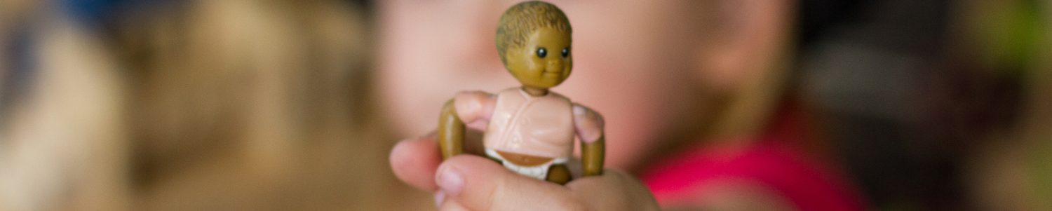 Te Pahu Preschool children playing with toy doll