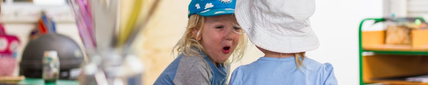 Te Pahu Preschooler laughing with his friends