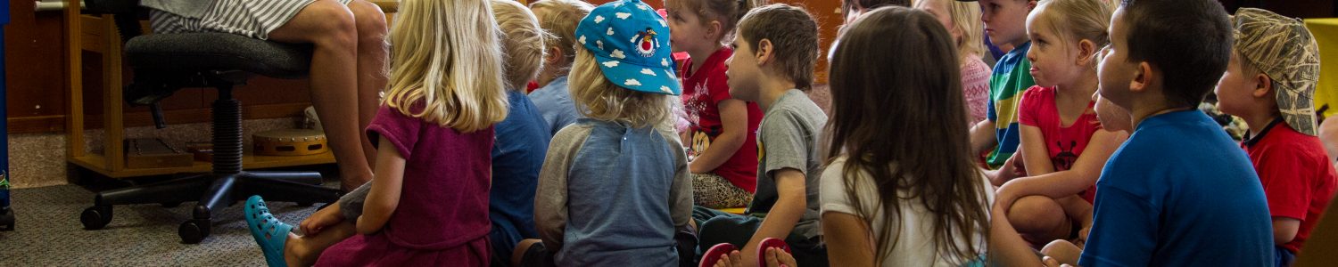 Te Pahu preschool children listening to story at mat time