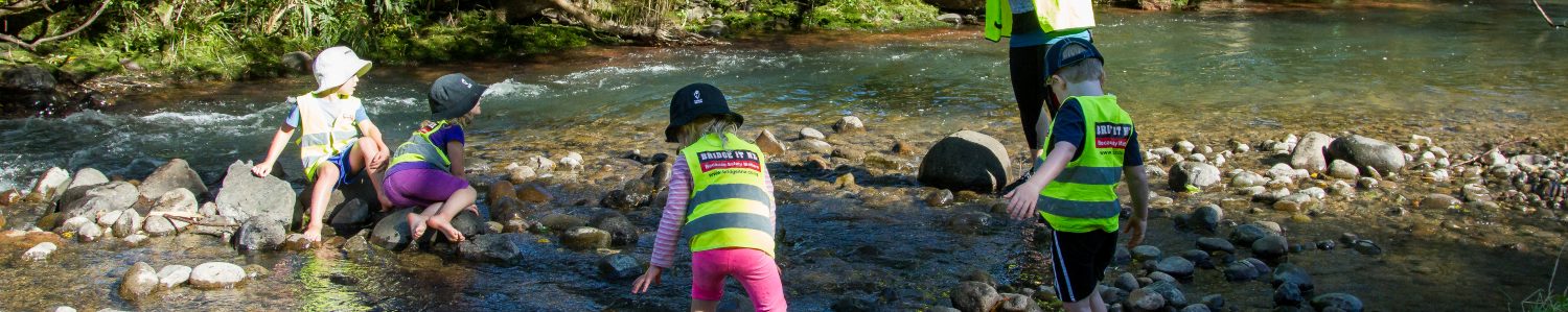 Te Pahu Preschool children explore the Kanikaniwha Stream at Forest School