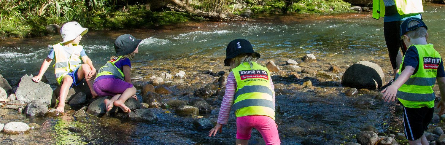 Te Pahu Preschool children explore the Kanikaniwha Stream at Forest School