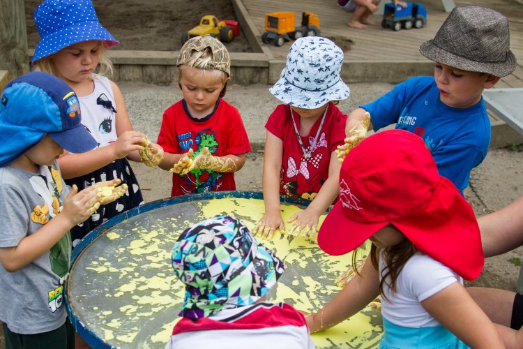 Te Pahu Preschool children enjoying messy play with paint and foam