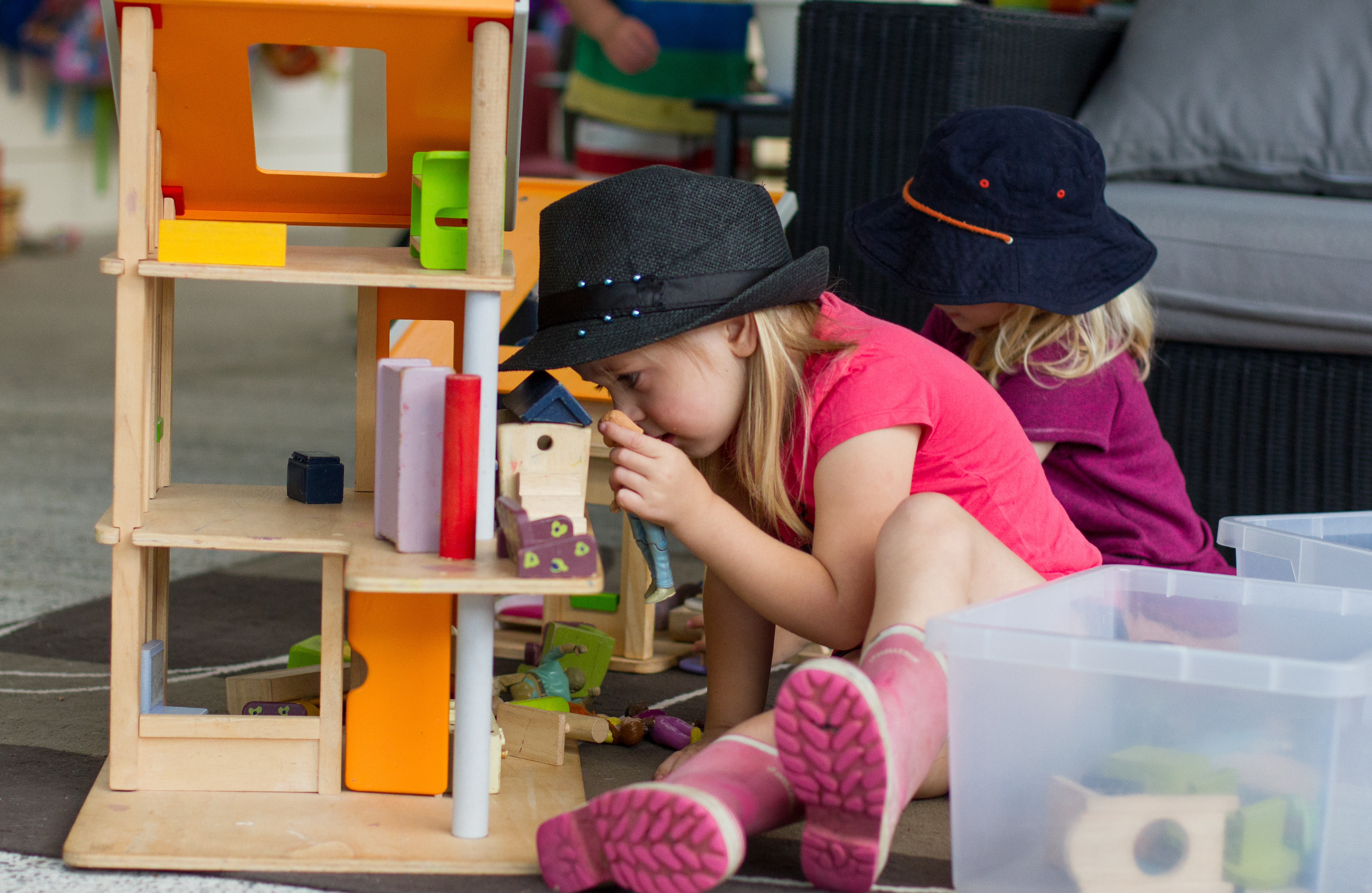 Te Pahu Preschool Child playing with the dolls house
