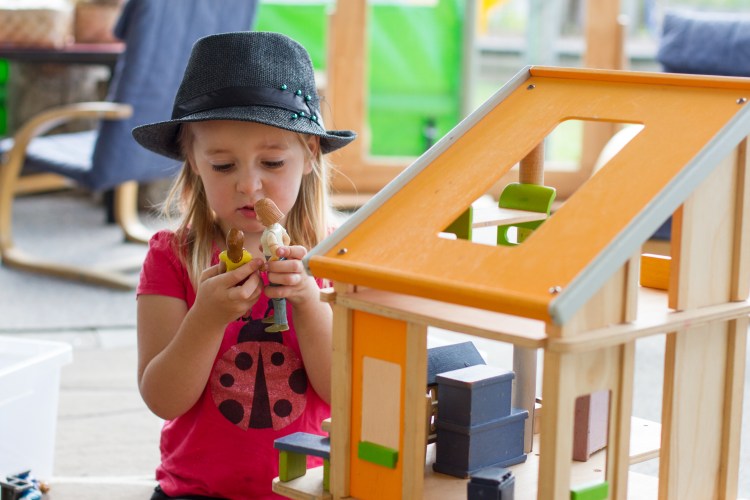 Te Pahu Preschool child playing with dolls