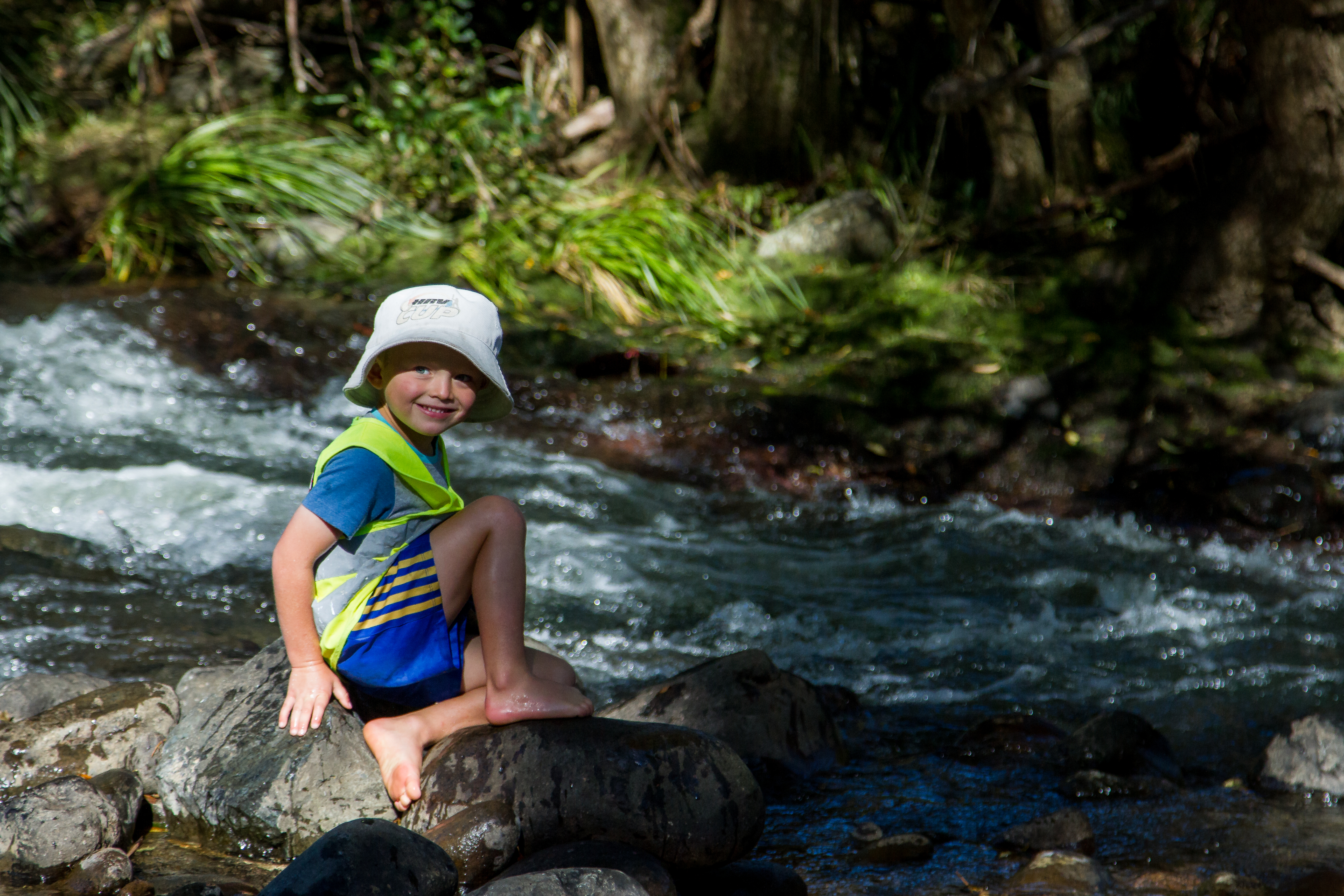 Te Pahu Preschooler exploring the Kanikaniwha stream at Forest School